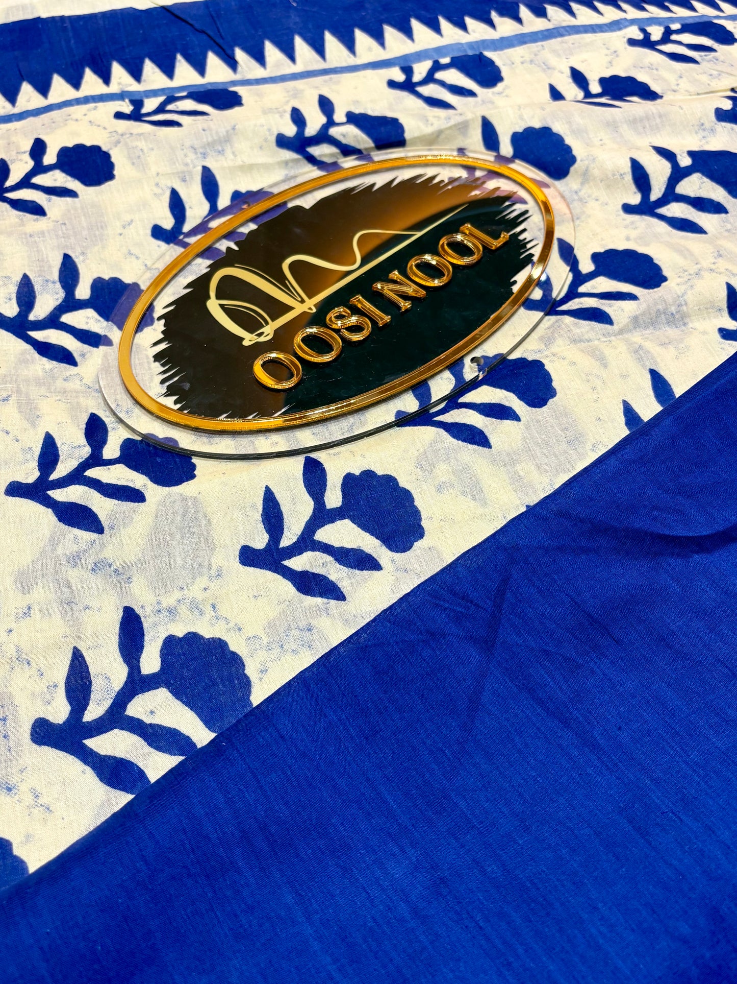 Beige Cotton Saree with Blue Floral Design