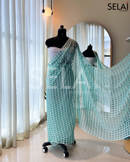 Checked Georgette Saree ( Light Blue) with Lace Blouse (White)