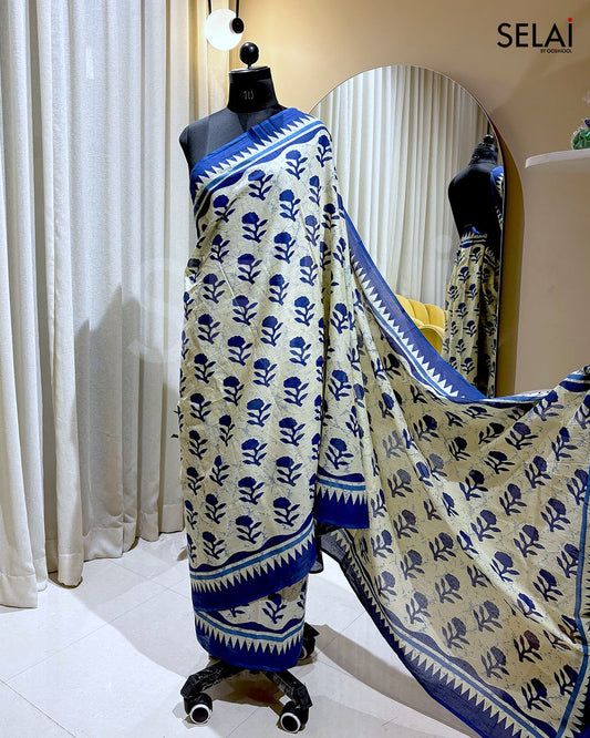 Beige Cotton Saree with Blue Floral Design